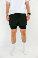 Black Apex running shorts 4-inch inseam on model by Nightclubs Suck