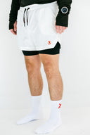 White Apex performance running shorts with liner on model by Nightclubs Suck