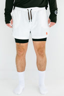 White Apex running shorts 4-inch inseam on model by Nightclubs Suck