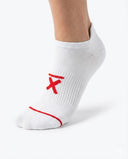 White low-cut Ghost performance running socks included in the Everyday Athlete Bundle by Nightclubs Suck