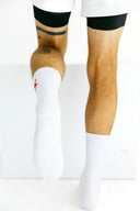 White Exo tall performance socks with red X detail by Nightclubs Suck