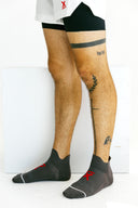 Gray low Ghost running socks with heel and toe padding by Nightclubs Suck