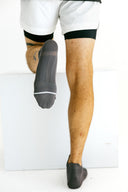 Gray low-cut Ghost running socks with red X detail by Nightclubs Suck