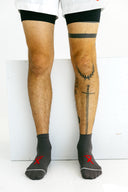 Gray mid Ghost running socks worn by an athlete by Nightclubs Suck