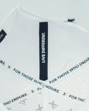 Inside of the white Redline hat showing For Those Who Endure taping by Nightclubs Suck