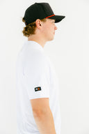White Threshold performance tee back view on model by Nightclubs Suck