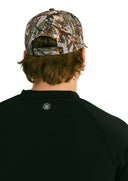 rear view of camo performance hat with orange X by Nightclubssuck