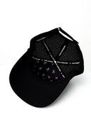 inside view of black performance hat with white X by Nightclubssuck