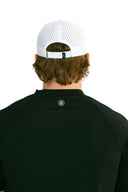 rear view of white performance hat with blue X by Nightclubssuck