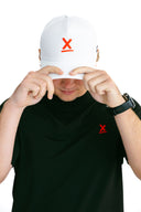 front view of model wearing white performance hat with red X by Nightclubssuck