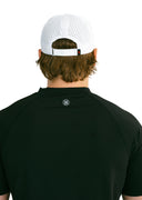 rear view of white performance hat with red X by Nightclubssuck