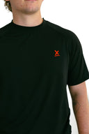 close up of red X on model wearing black performance tee with red X by Nightclubssuck